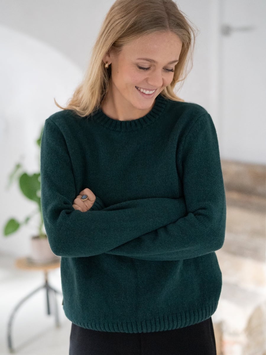 A FUXBAU merino knit sweater, photographed for the product gallery