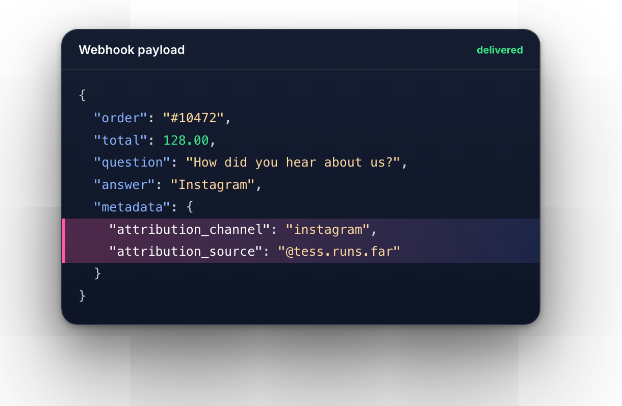 Webhook payload with attribution_channel and attribution_source